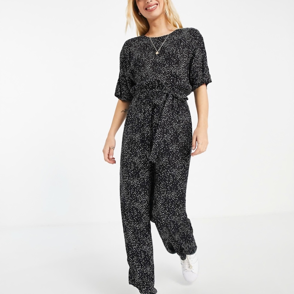 ASOS DESIGN tie waist jumpsuit in polka dot print